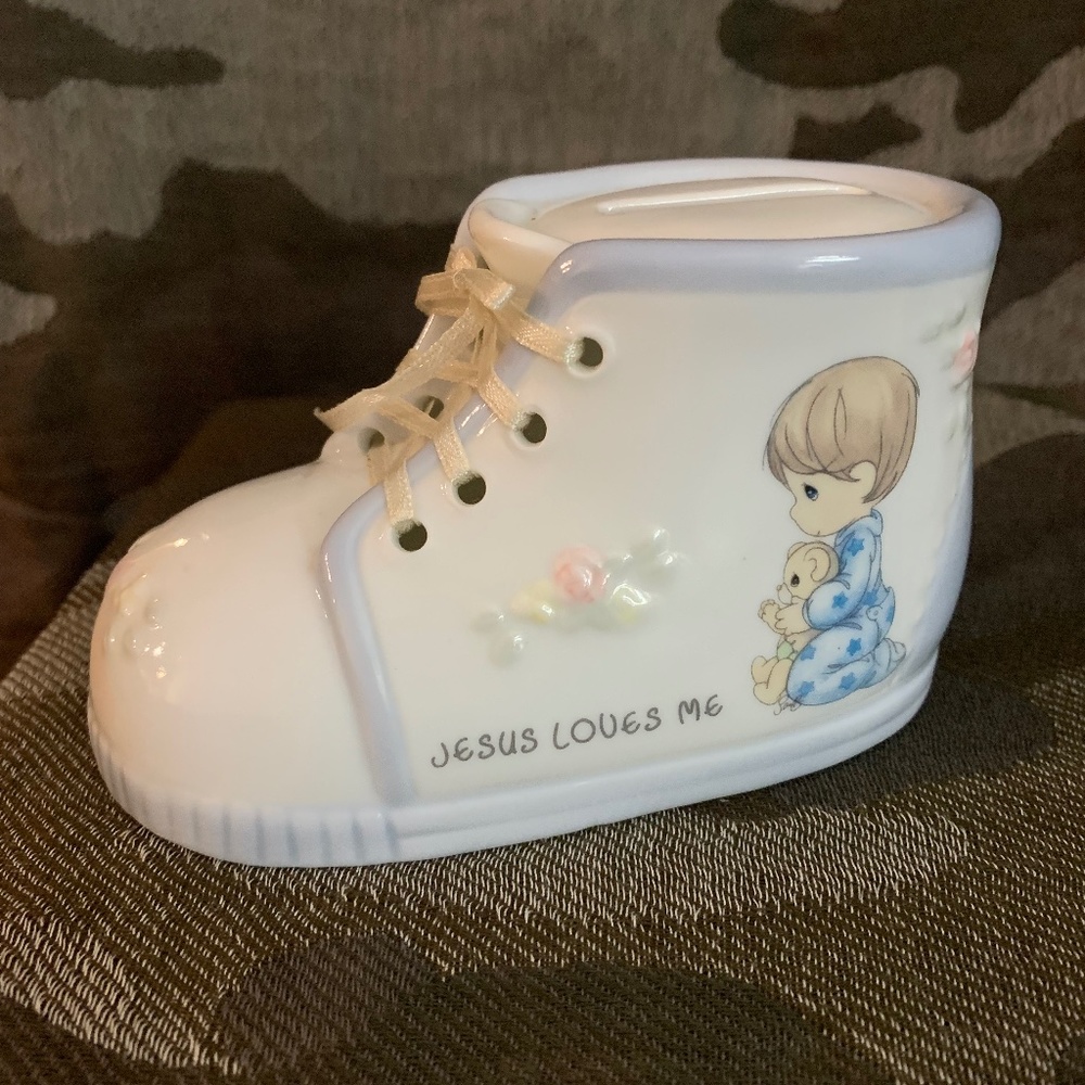Precious Moments baby bootie bank.